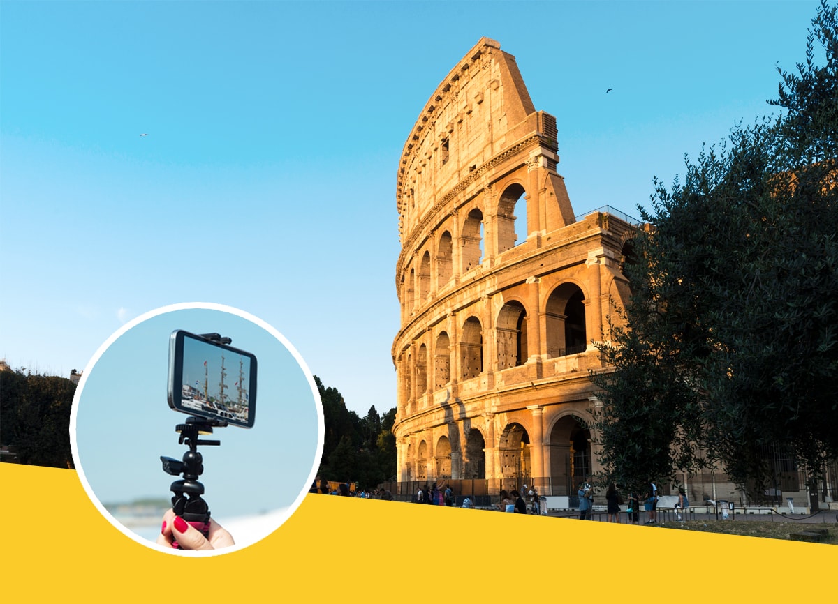 A shot of the Colosseum in Rome during sunset, with a person holding a selfie stick pointed at a 17th century ship within the roundel. 