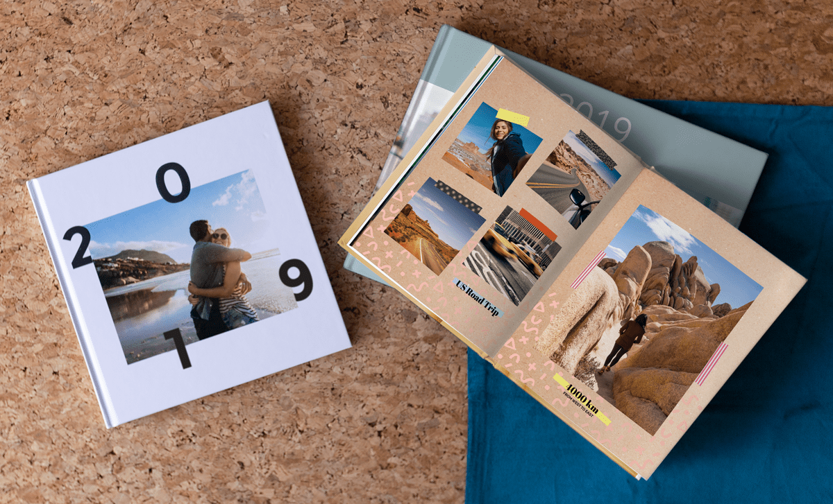 Photo book customised with clip art and backgrounds