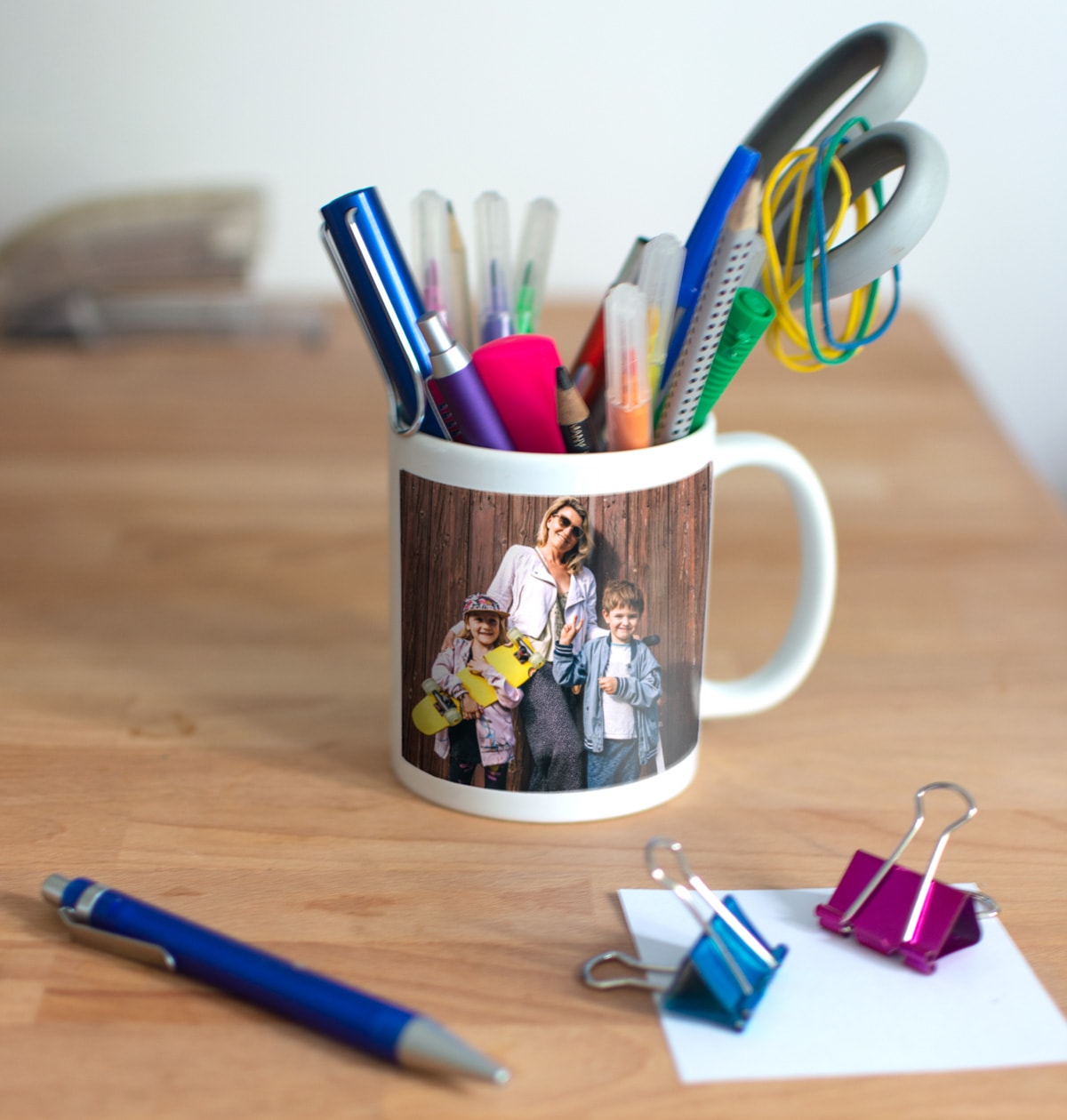 Two photo mugs used as make-up brush holders to tidy a dressing table